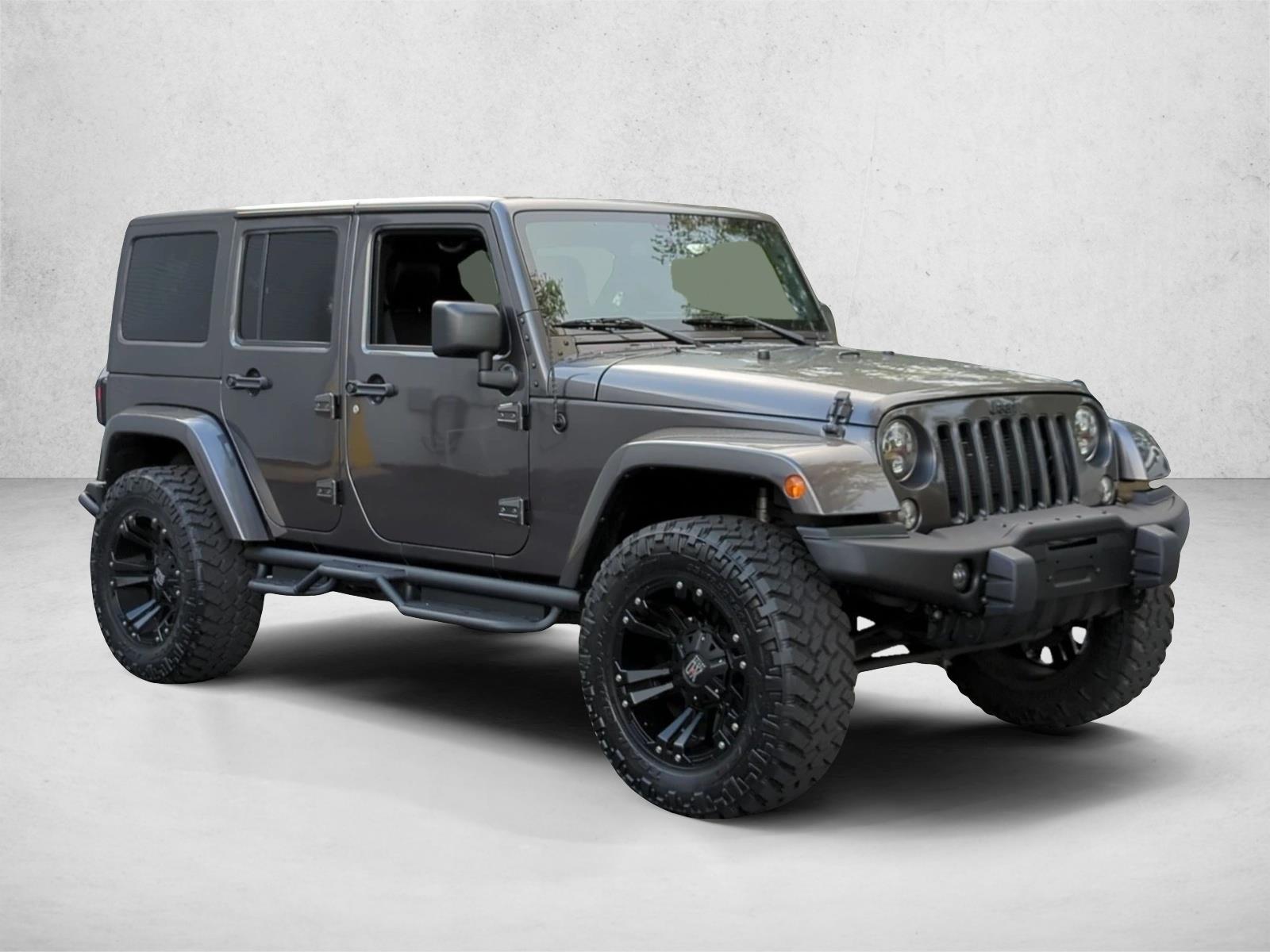 Used 2016 Granite Crystal Metallic Clearcoat Jeep Backcountry image 3