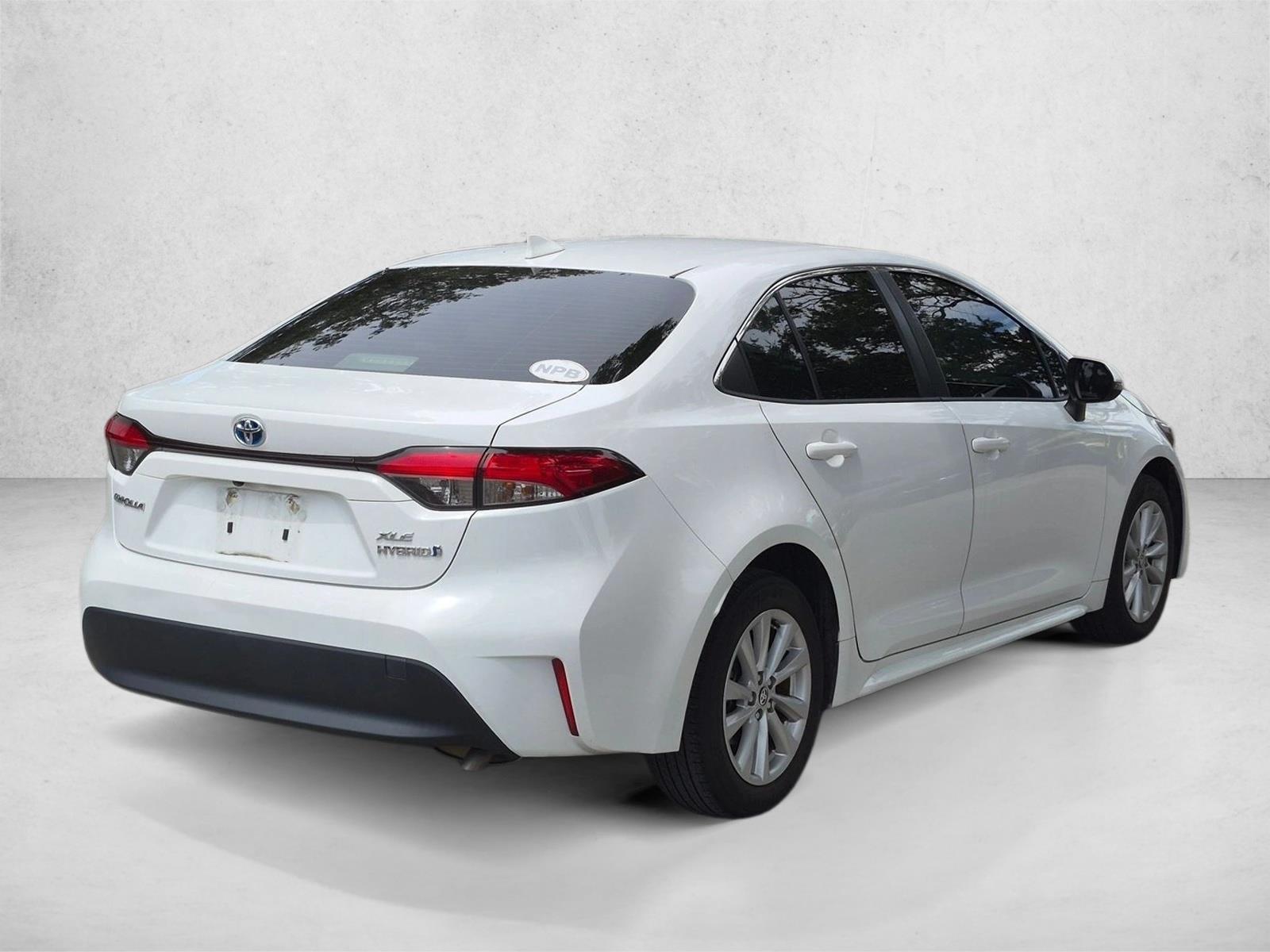 Used 2023 White Toyota Hybrid XLE image 4