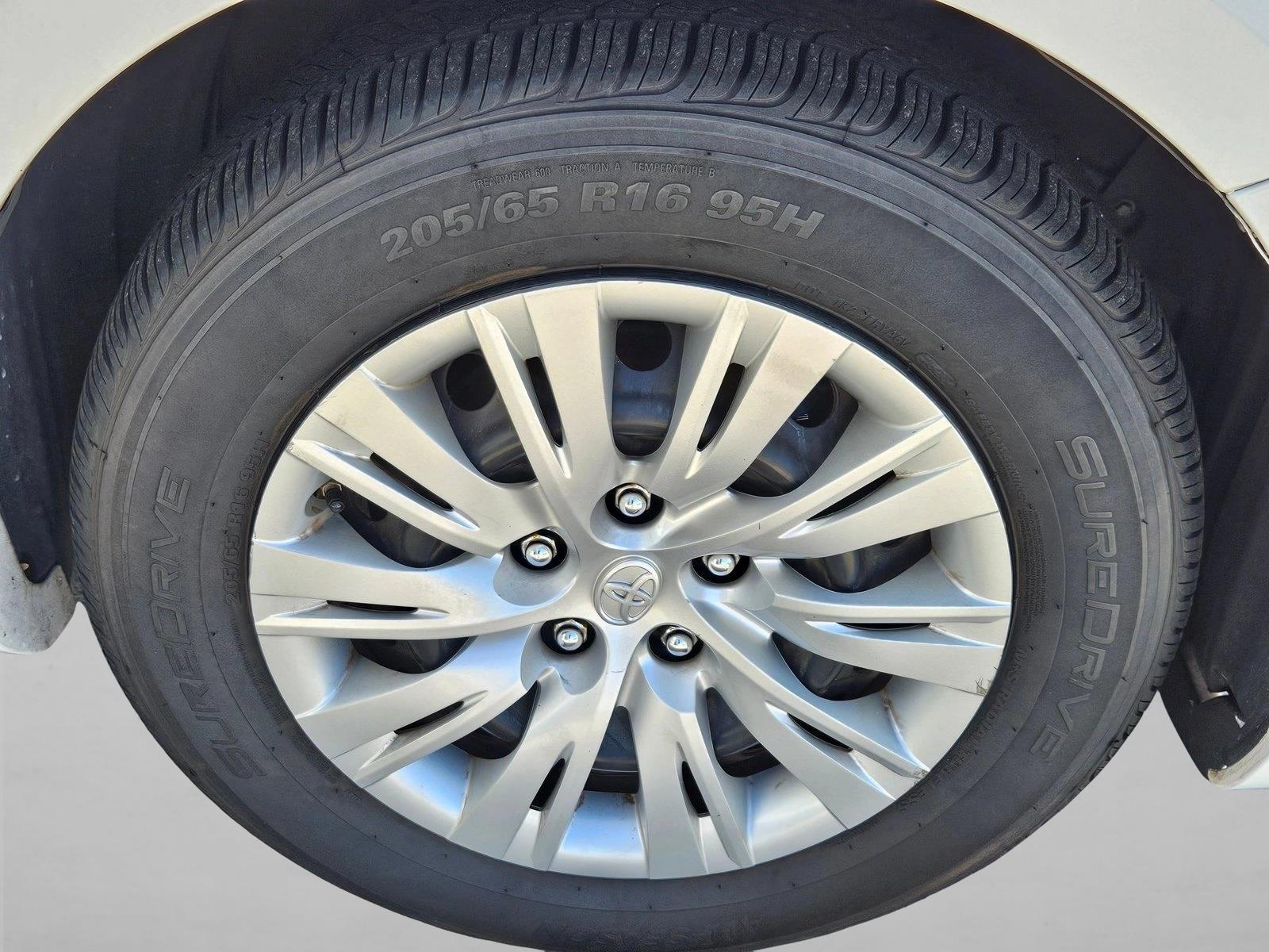 Used 2013 Super White Toyota LE image 6