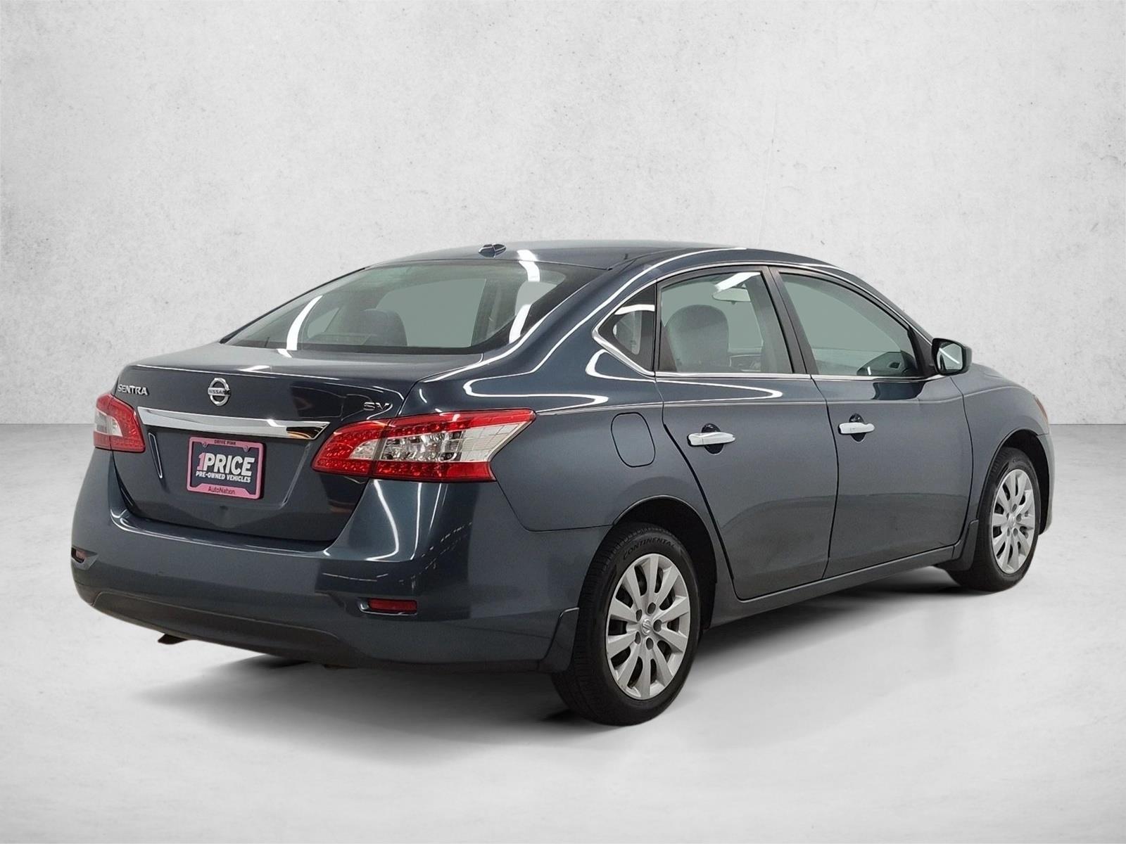 Used 2013 Graphite Blue Nissan SV image 5