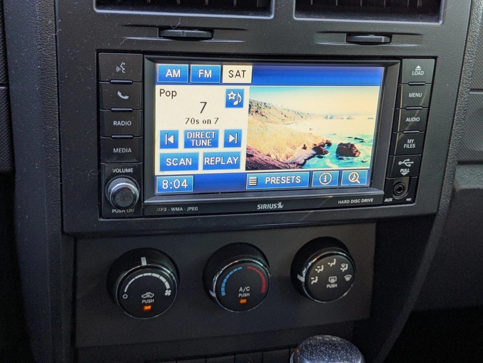 Used 2011 Bright Silver Metallic Dodge Heat image 10