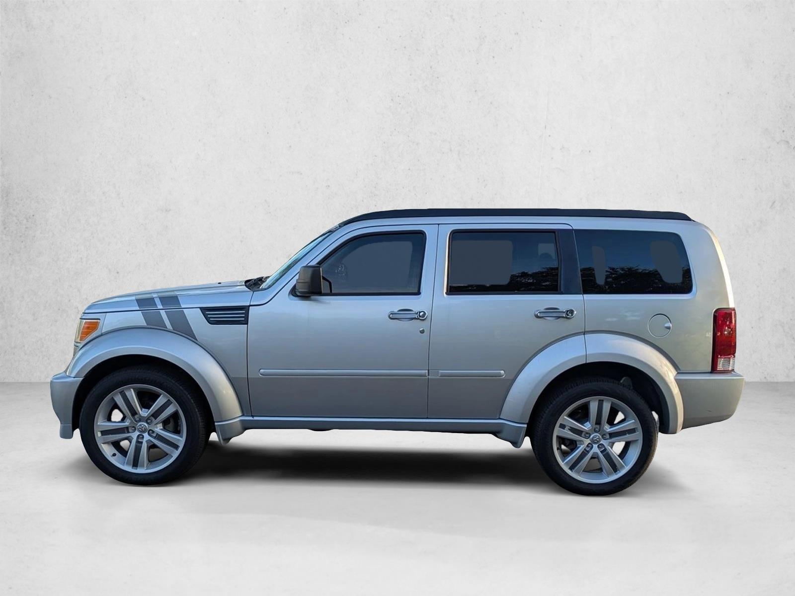 Used 2011 Bright Silver Metallic Dodge Heat image 4