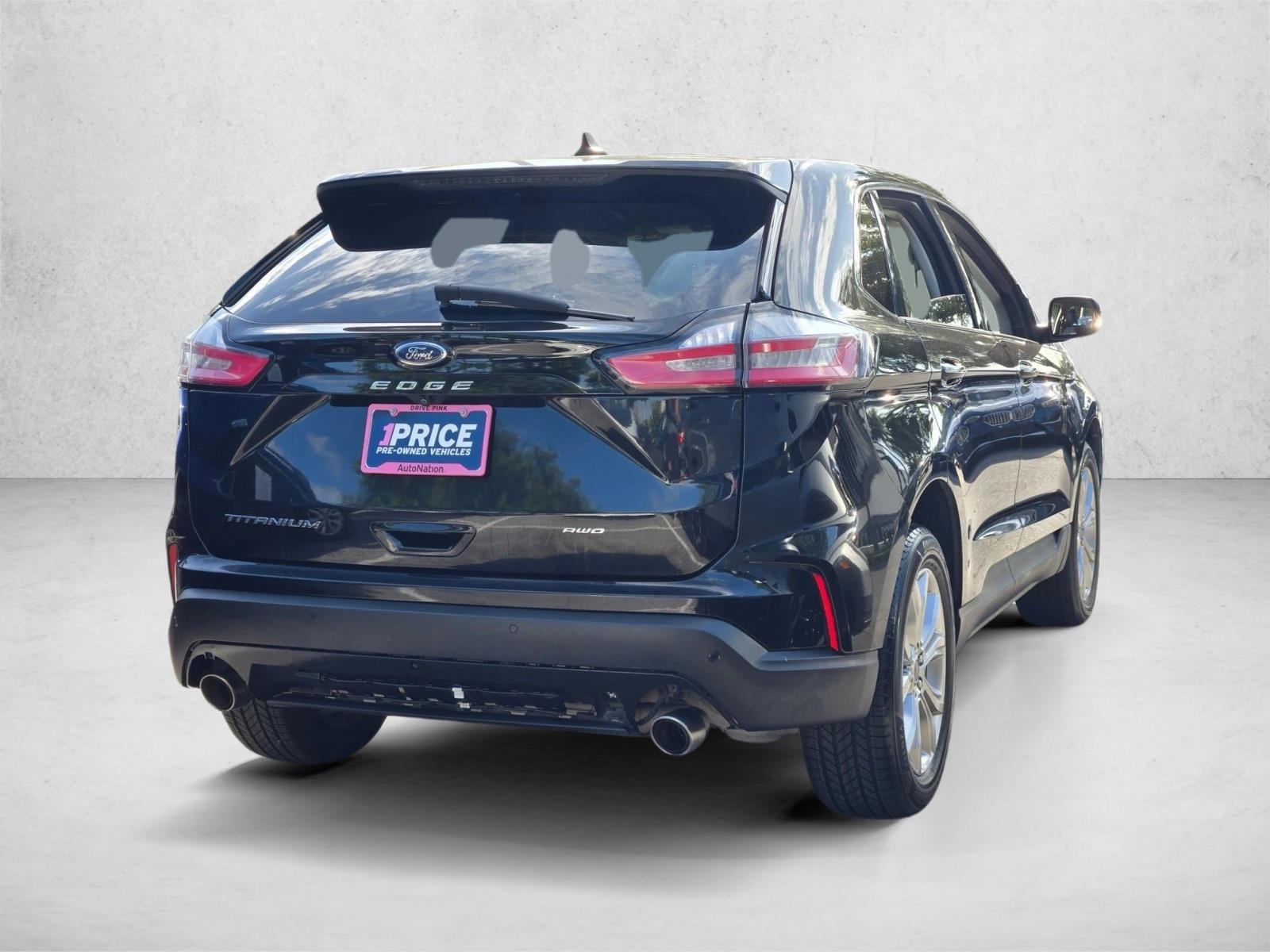 Used 2022 Agate Black Metallic Ford Titanium image 5