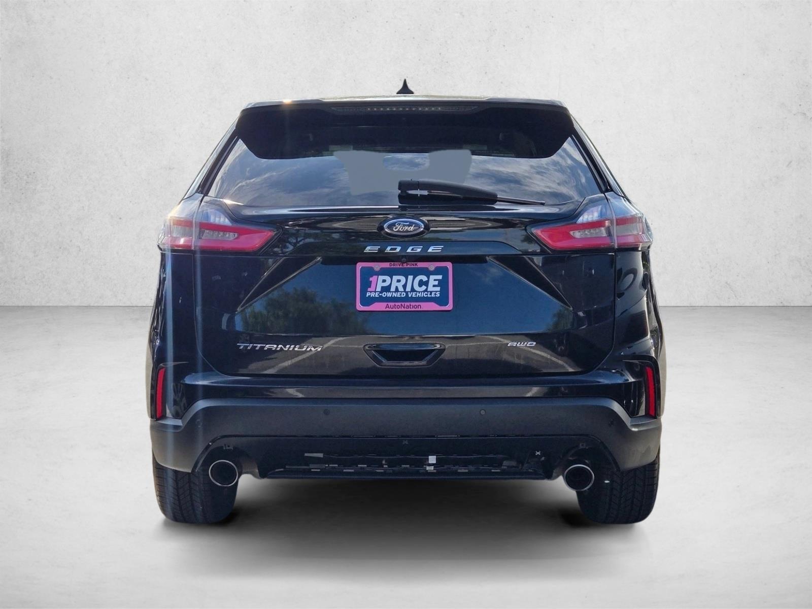 Used 2022 Agate Black Metallic Ford Titanium image 6