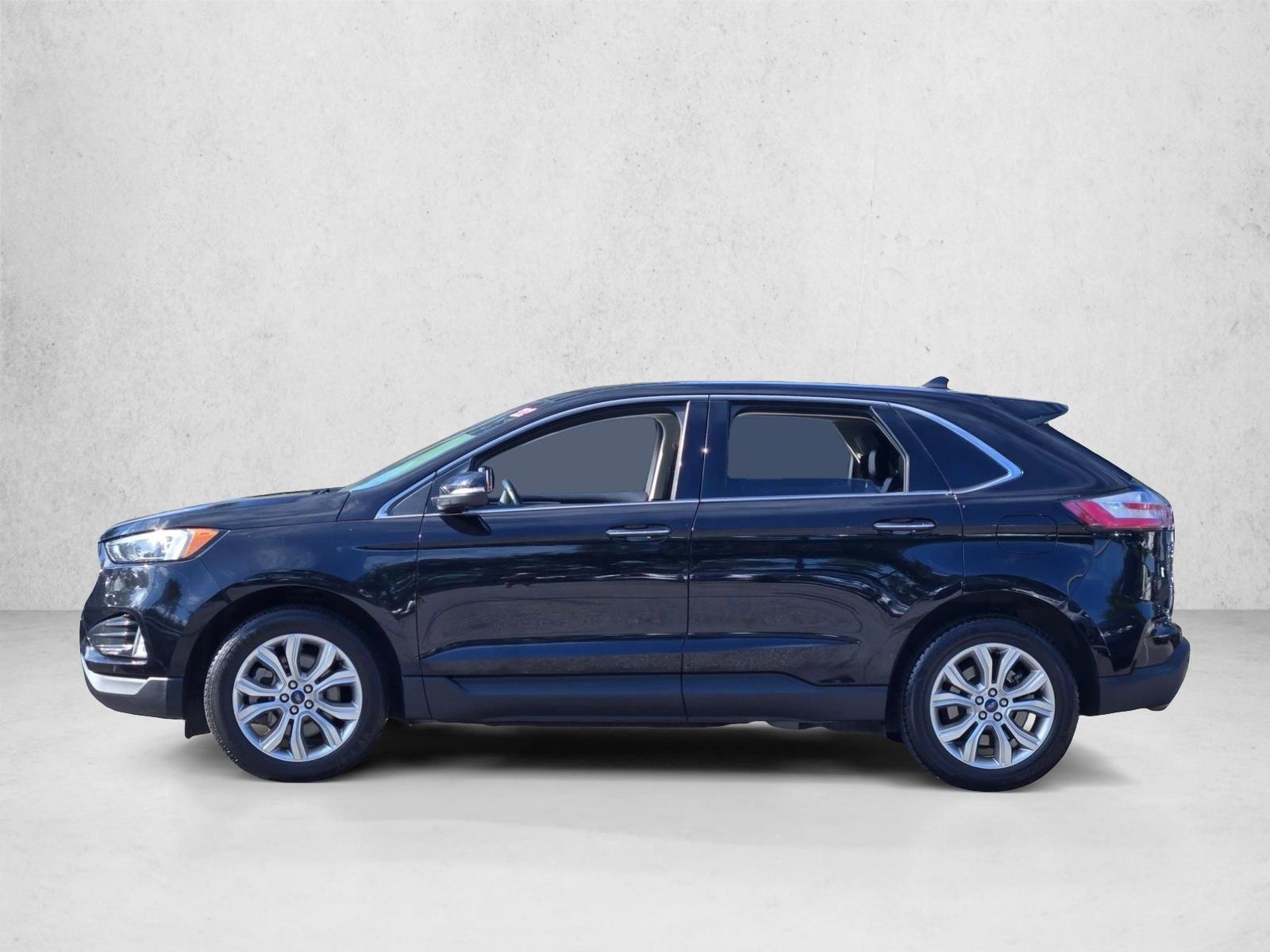 Used 2022 Agate Black Metallic Ford Titanium image 8