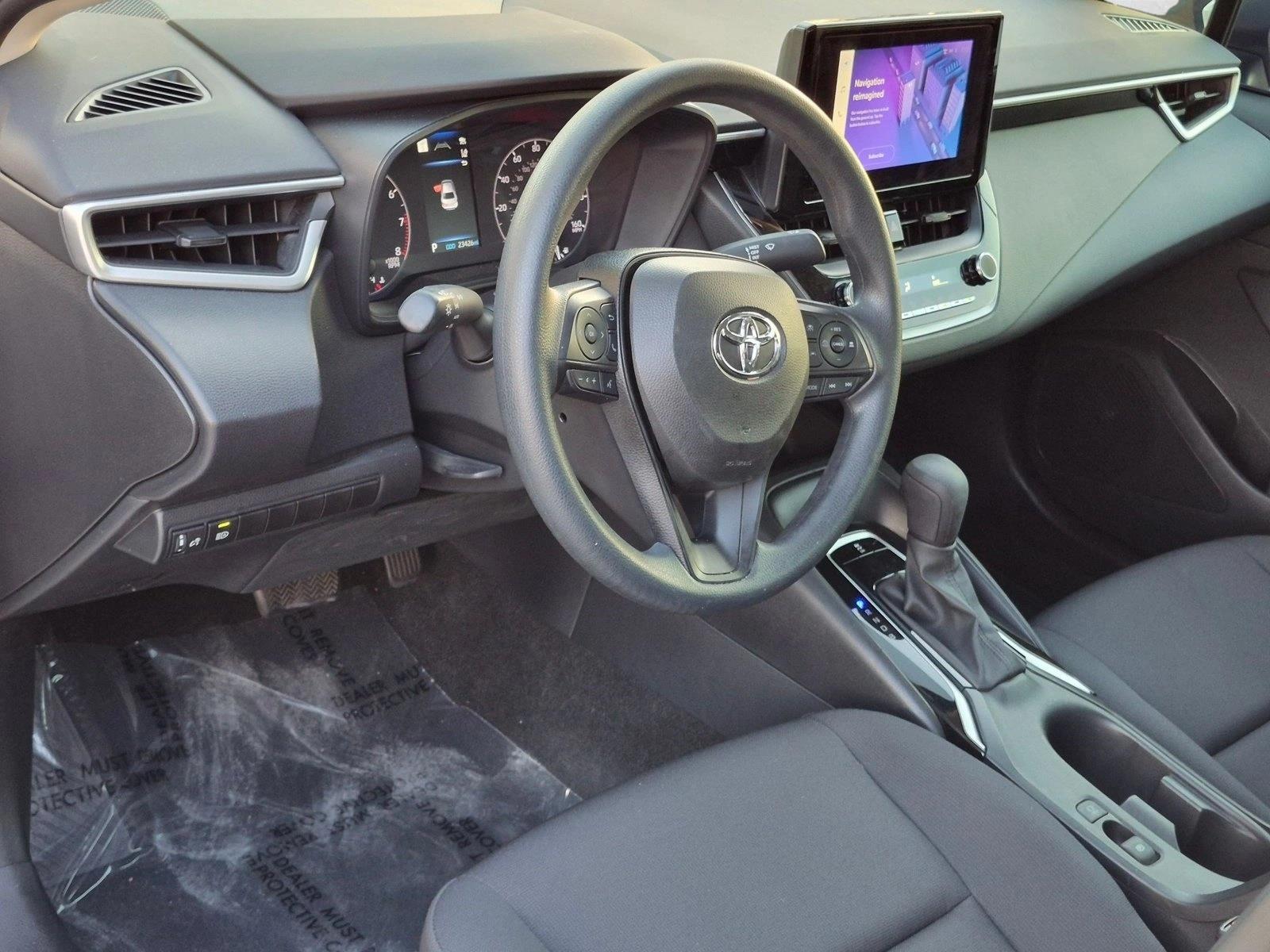 Used 2023 Classic Silver Metallic Toyota LE image 9