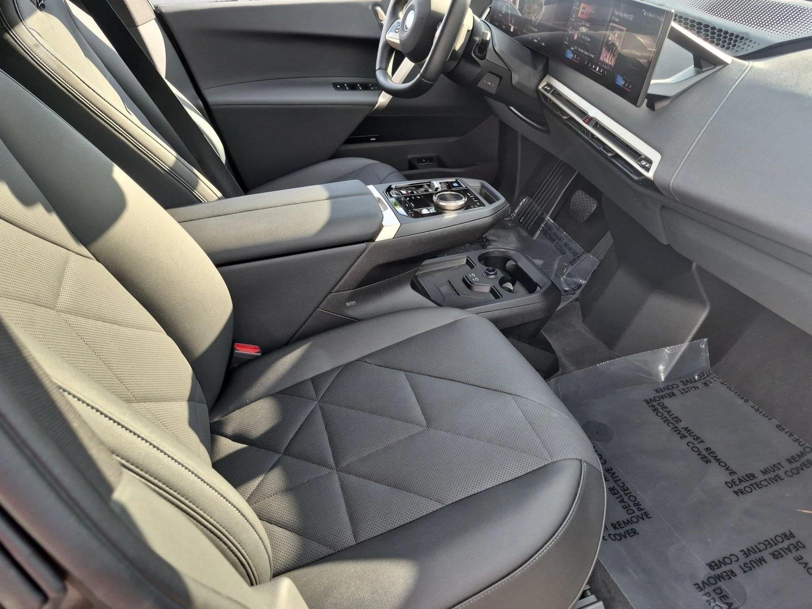 Used 2024 Black Sapphire Metallic BMW xDrive50 image 22
