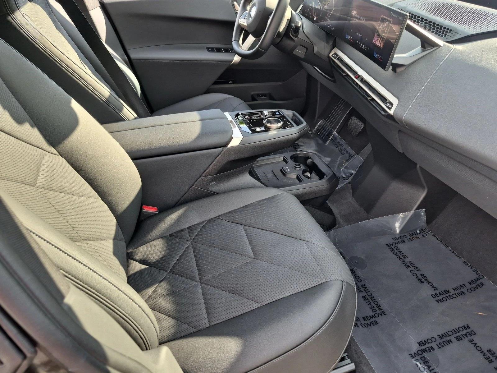 Used 2024 Black Sapphire Metallic BMW xDrive50 image 23