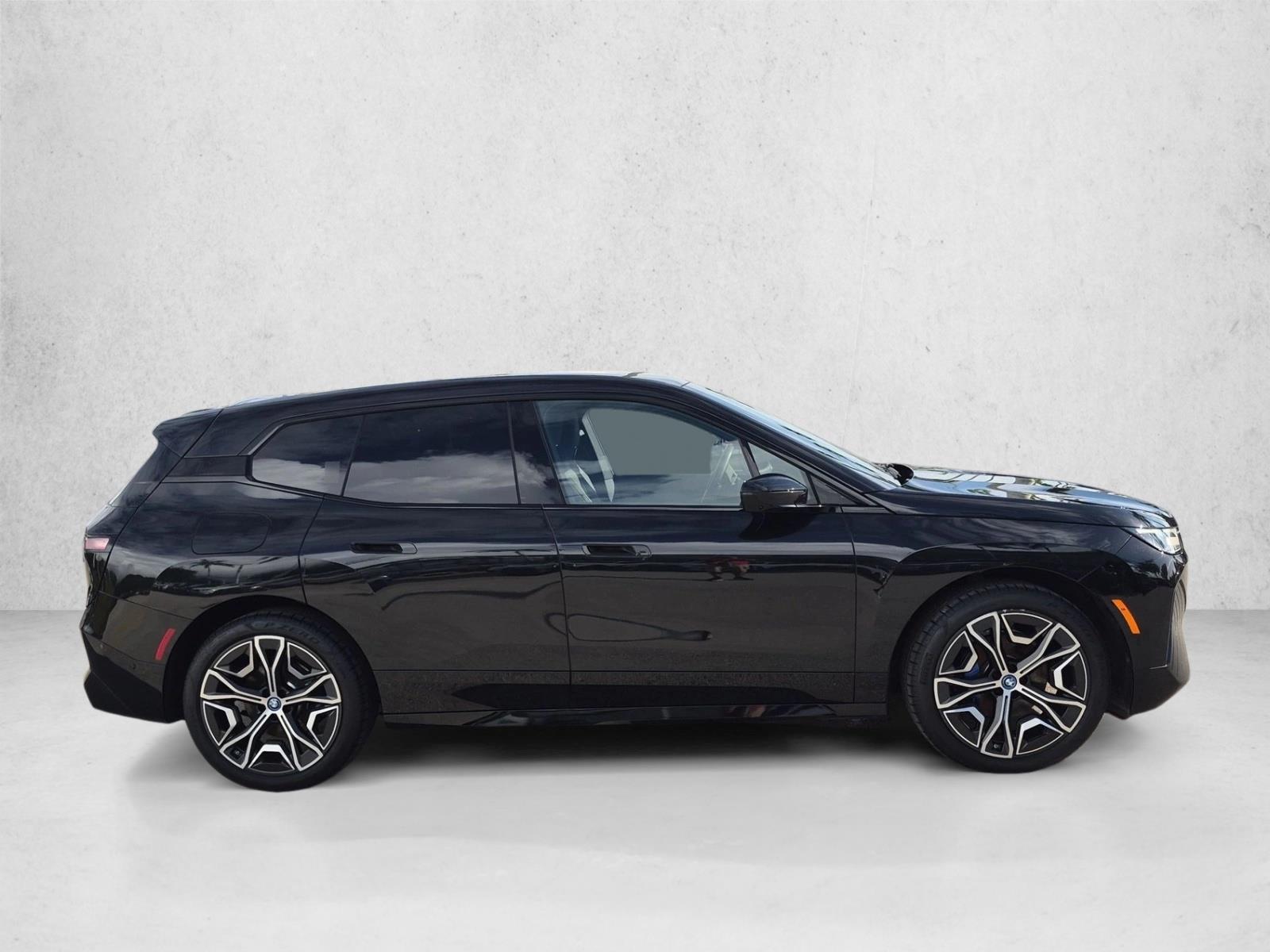 Used 2024 Black Sapphire Metallic BMW xDrive50 image 4