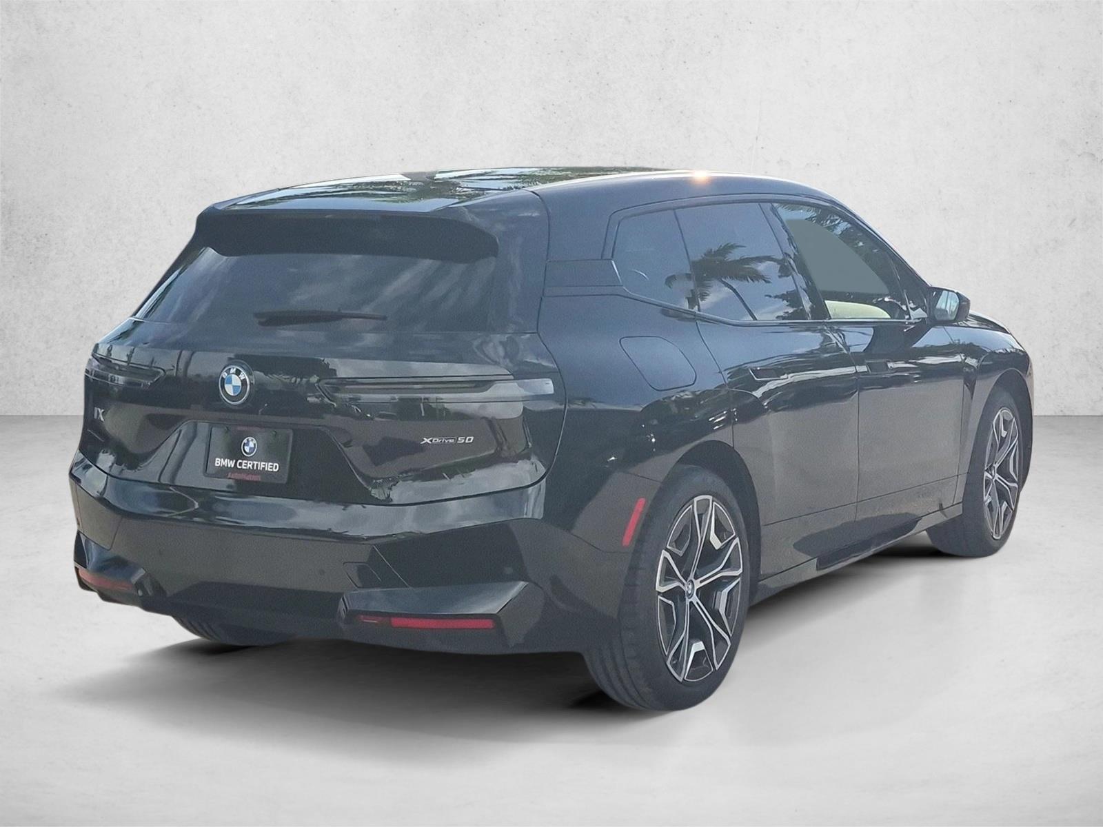 Used 2024 Black Sapphire Metallic BMW xDrive50 image 5