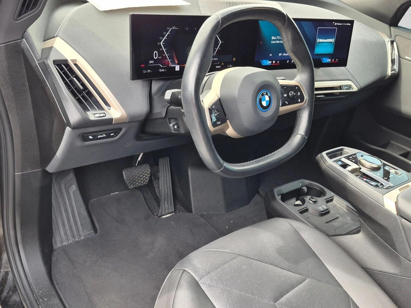 Used 2024 Black Sapphire Metallic BMW xDrive50 image 4