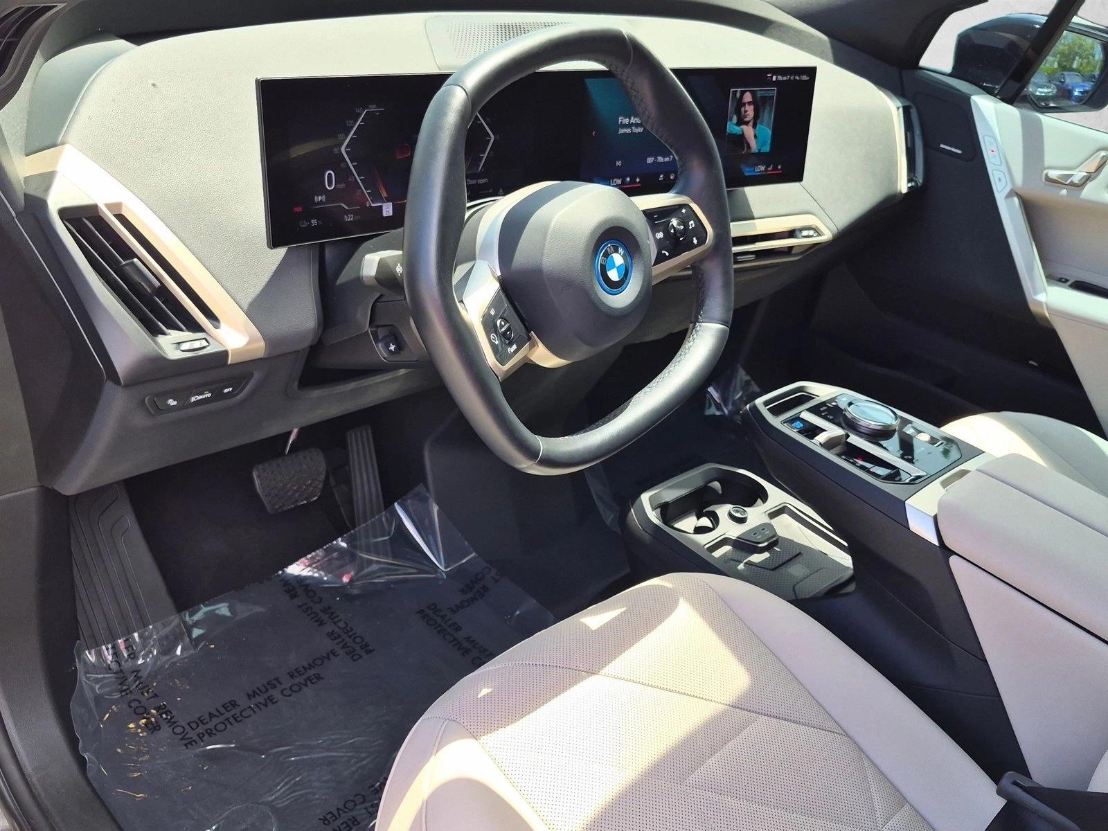 Used 2024 Black Sapphire Metallic BMW xDrive50 image 10