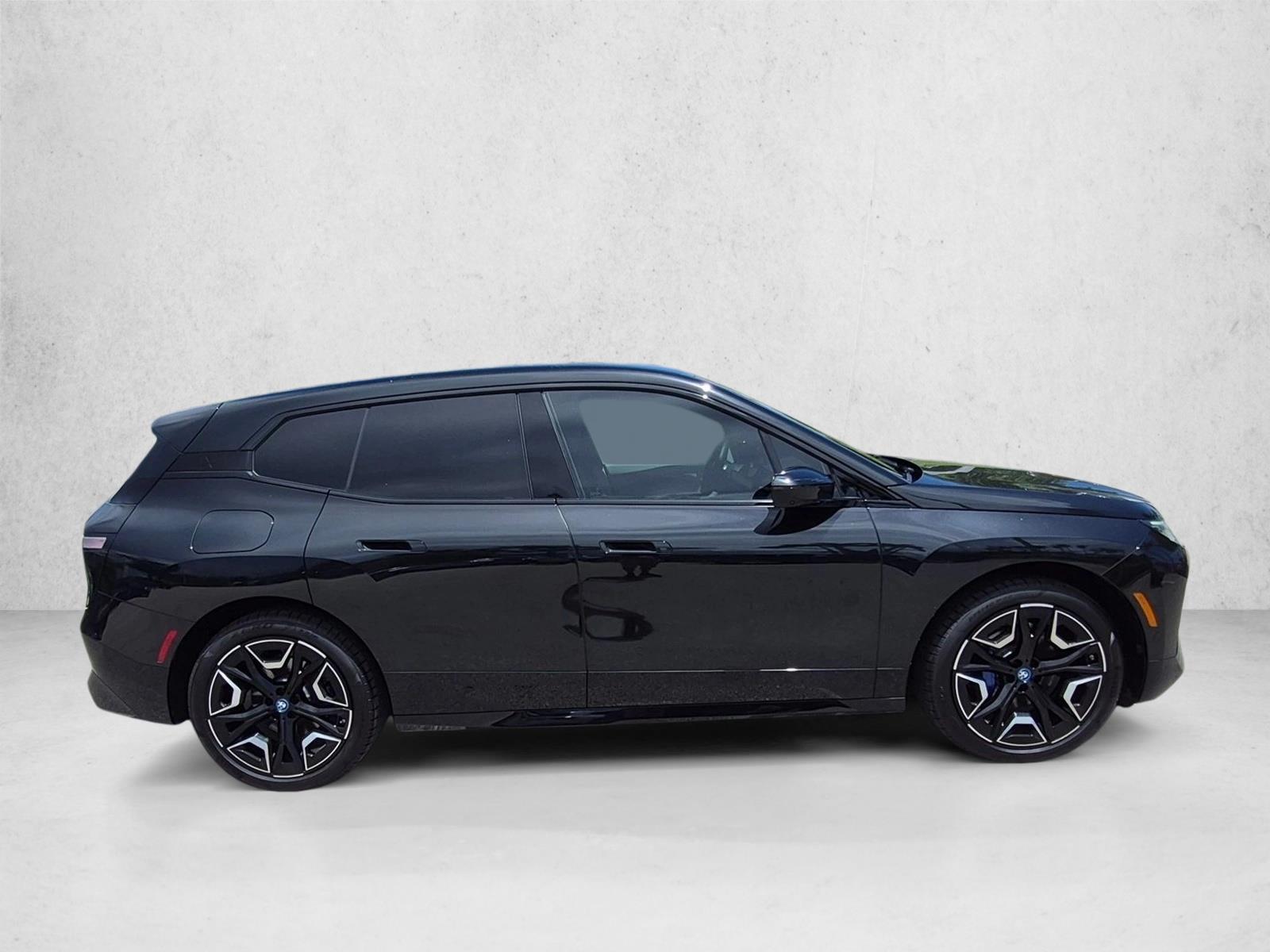 Used 2024 Black Sapphire Metallic BMW xDrive50 image 4