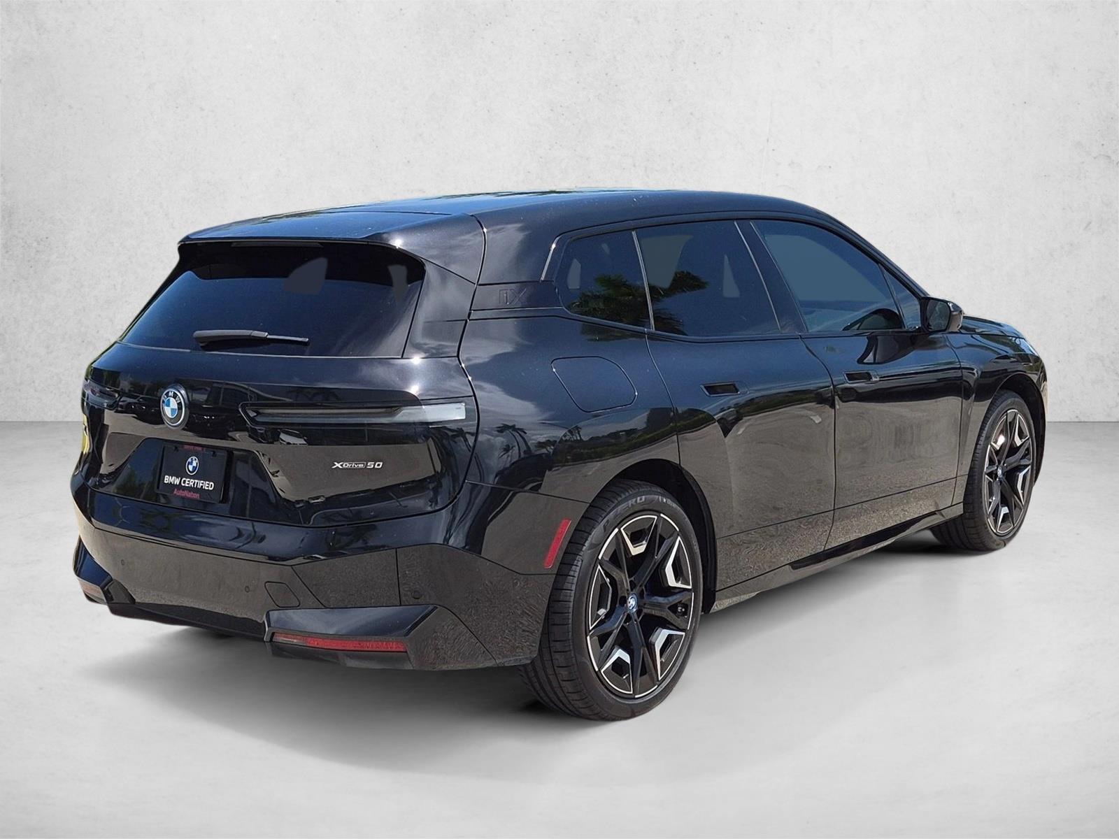 Used 2024 Black Sapphire Metallic BMW xDrive50 image 5