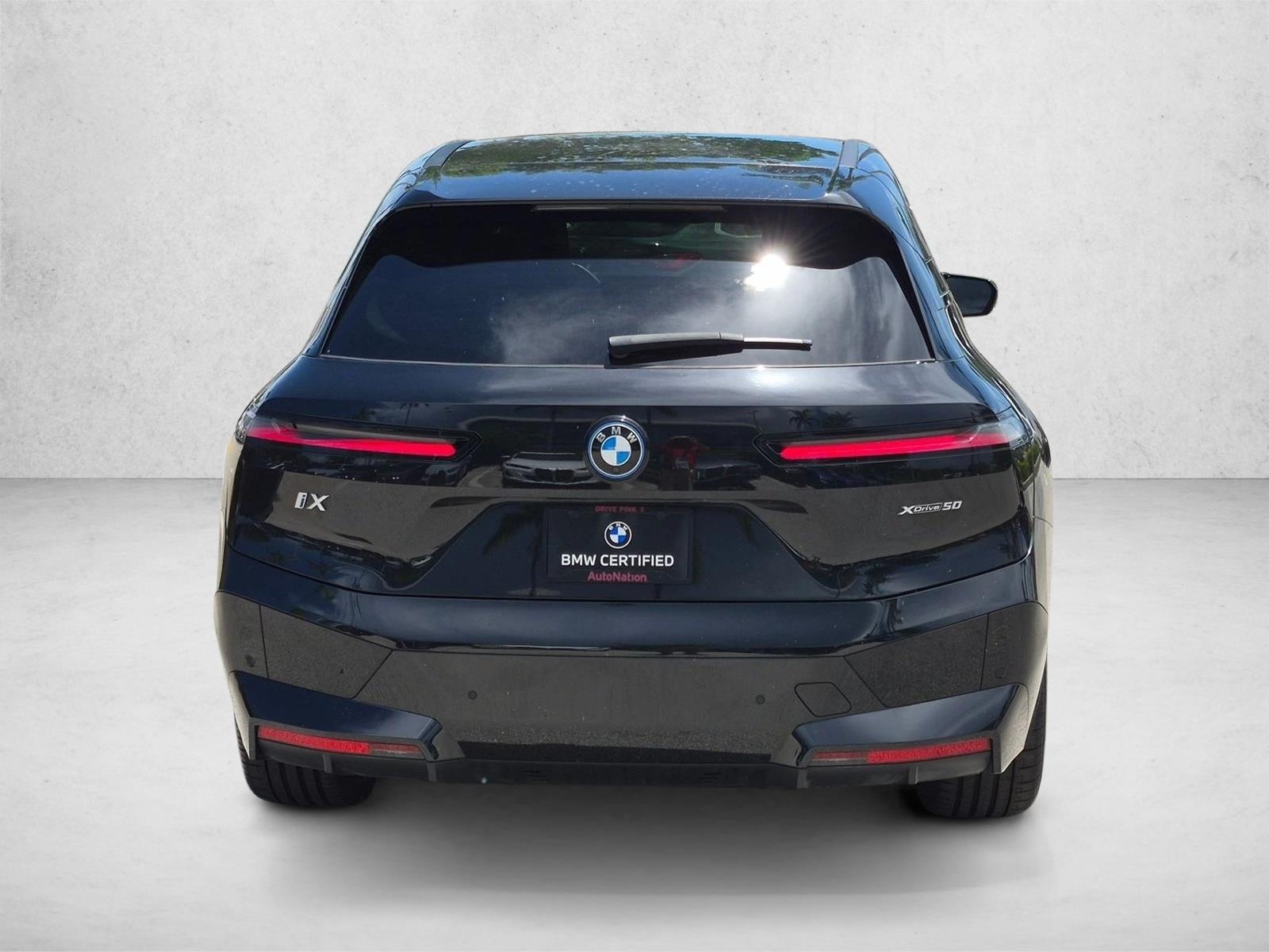 Used 2024 Black Sapphire Metallic BMW xDrive50 image 7