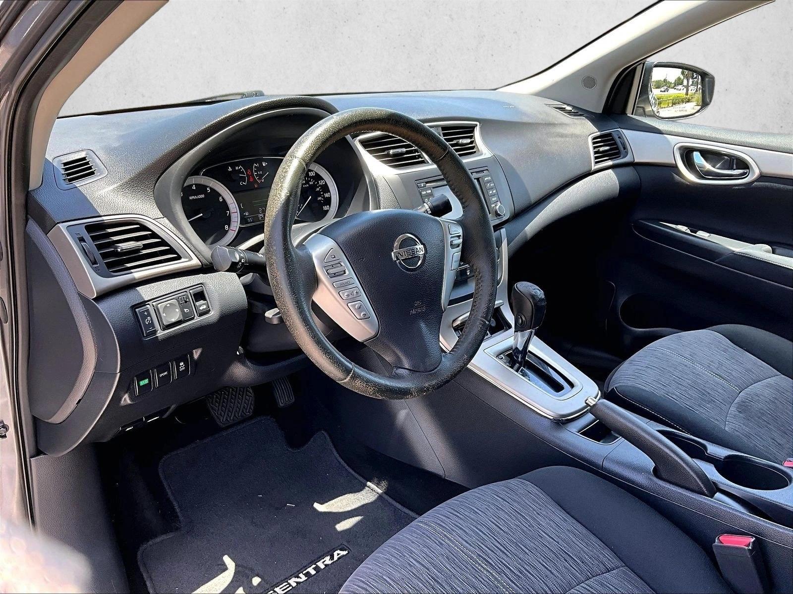 Used 2015 Gun Metallic Nissan SV image 14