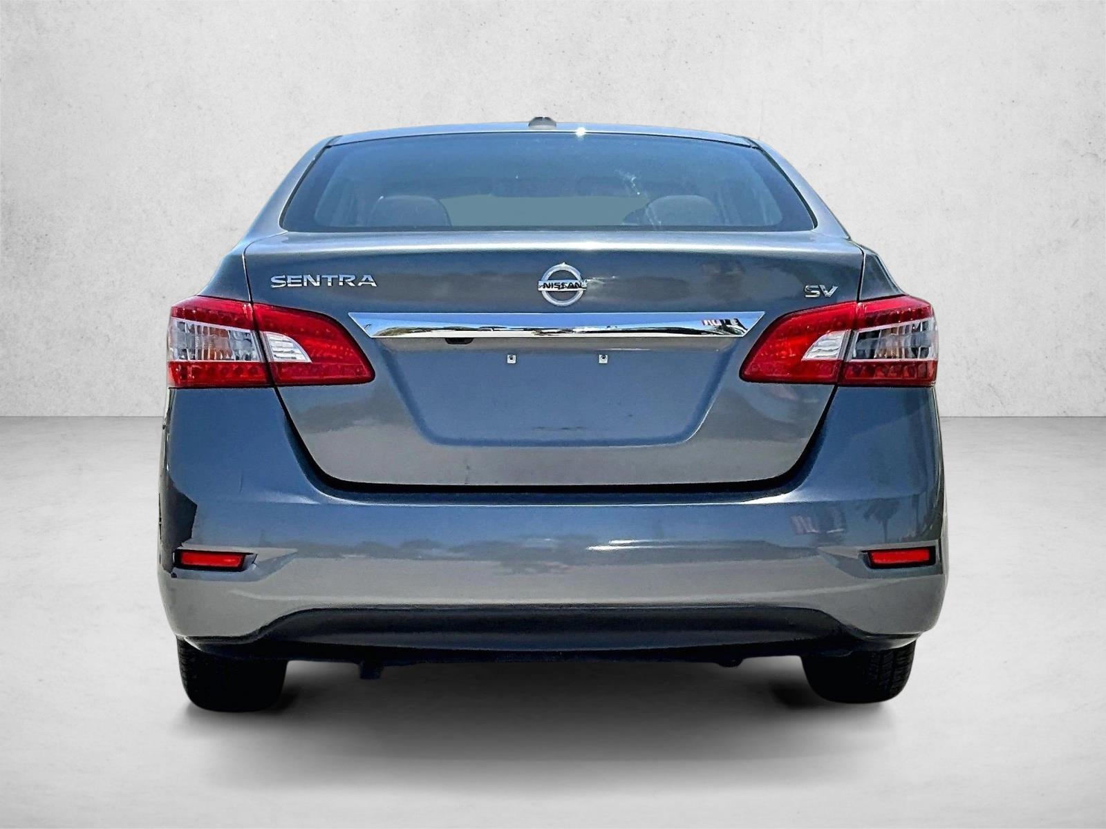 Used 2015 Gun Metallic Nissan SV image 4