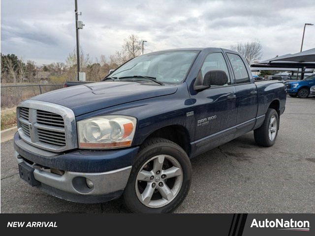 Black 2006 Dodge RAM 1500 SLT Quad Cab 4WD Pickup Truck Four-Wheel Drive 5-Speed Automatic