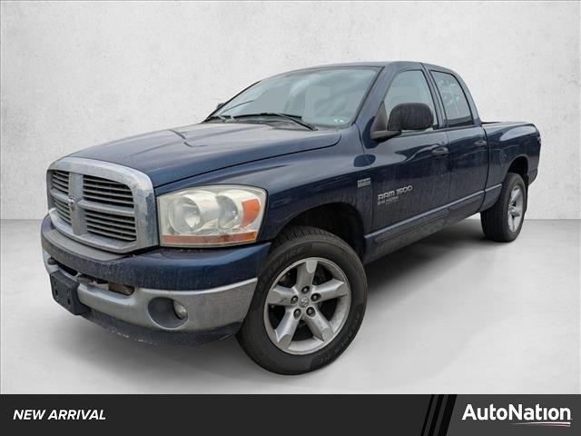 Black 2006 Dodge RAM 1500 SLT Quad Cab 4WD Pickup Truck Four-Wheel Drive 5-Speed Automatic