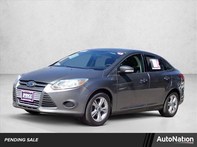 Gray (Sterling Grey Metallic) 2013 Ford Focus SE Sedan Front-Wheel Drive 5-Speed Manual