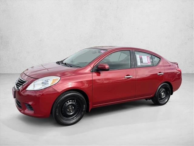 Red Brick 2014 Nissan Versa 1.6 SV Sedan Front-Wheel Drive Automatic