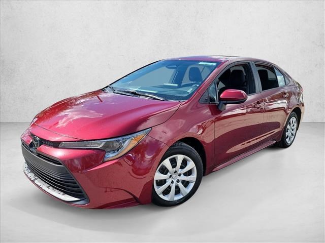 Red (Ruby Flare Pearl) 2025 Toyota Corolla LE FWD Sedan Front-Wheel Drive Automatic